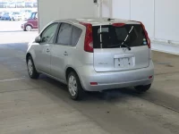 Nissan NOTE лот № 2310 оценка RA  с аукциона в Японии 1