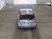 Nissan NOTE лот № 2310 оценка RA  с аукциона в Японии 2