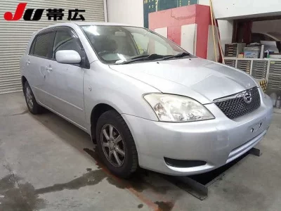 Toyota COROLLA RUNX  с аукциона в Японии