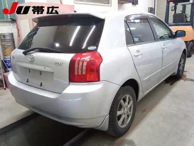 Toyota COROLLA RUNX  с аукциона в Японии