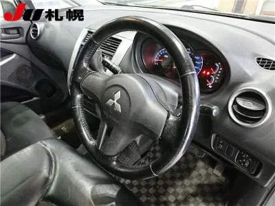 Mitsubishi COLT PLUS  с аукциона в Японии