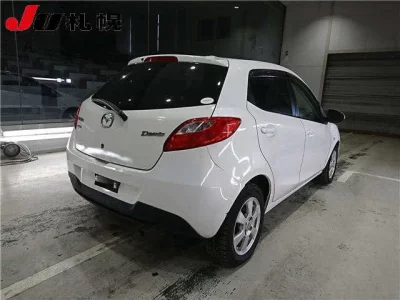 Mazda DEMIO  с аукциона в Японии