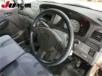 Daihatsu MOVE  с аукциона в Японии