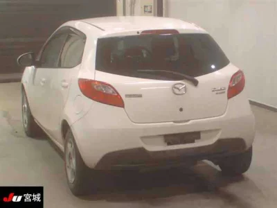 Mazda DEMIO  с аукциона в Японии