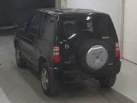 Nissan KIX лот № 5100 оценка R  с аукциона в Японии 1