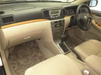 Toyota COROLLA RUNX лот № 70297 оценка 3.5  с аукциона в Японии 3