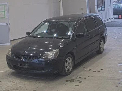 Mitsubishi LANCER  с аукциона в Японии