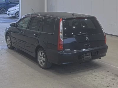 Mitsubishi LANCER  с аукциона в Японии