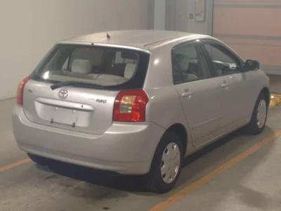 Toyota COROLLA RUNX  с аукциона в Японии