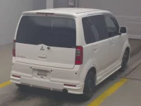 Mitsubishi EK SPORTS лот № 4412 оценка 3.5  с аукциона в Японии 1