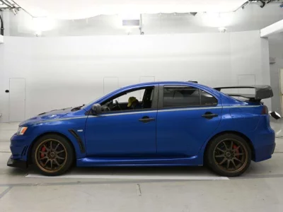 Mitsubishi LANCER  с аукциона в Японии