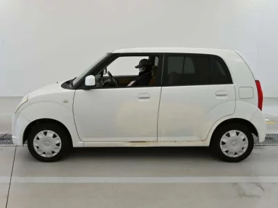 Nissan PINO  с аукциона в Японии