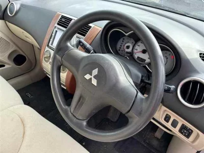 Mitsubishi COLT PLUS  с аукциона в Японии