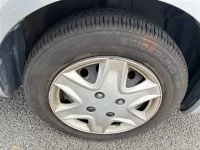 Toyota RAUM лот № 70123 оценка 4  с аукциона в Японии 8