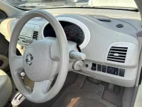 Nissan MARCH лот № 90325 оценка 3.5  с аукциона в Японии 2