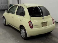 Nissan MARCH лот № 90325 оценка 3.5  с аукциона в Японии 1