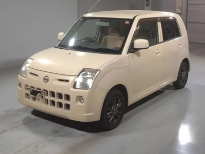 Nissan PINO  с аукциона в Японии