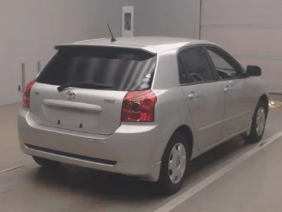 Toyota COROLLA RUNX  с аукциона в Японии