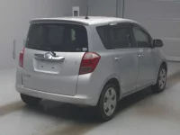 Toyota RACTIS лот № 29080 оценка RA  с аукциона в Японии 1