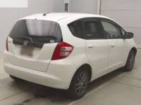 Honda FIT лот № 79009 оценка RA  с аукциона в Японии 1