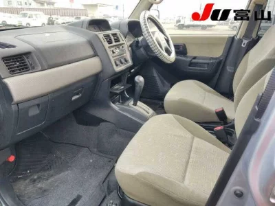 Mitsubishi PAJERO IO  с аукциона в Японии