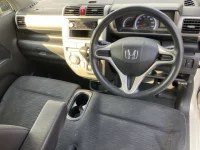 Honda ZEST лот № 1036 оценка RA  с аукциона в Японии 3