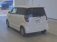 Honda ZEST лот № 1036 оценка RA  с аукциона в Японии 1