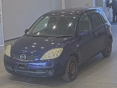 Mazda DEMIO  с аукциона в Японии