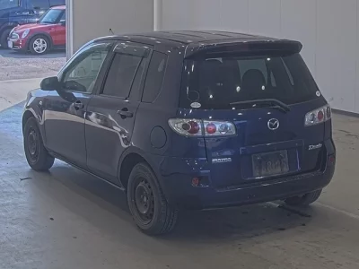 Mazda DEMIO  с аукциона в Японии