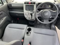 Honda ZEST лот № 1023 оценка 3.5  с аукциона в Японии 3
