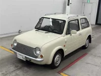 Nissan PAO лот № 30124 оценка 3.5  с аукциона в Японии 3