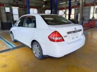 Nissan TIIDA LATIO лот № 7503 оценка 4  с аукциона в Японии 1