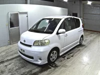 Toyota PORTE лот № 9377 оценка 4  с аукциона в Японии 3