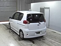 Toyota PORTE лот № 9377 оценка 4  с аукциона в Японии 1