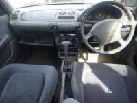 Nissan MARCH лот № 9389 оценка 3.5  с аукциона в Японии 2