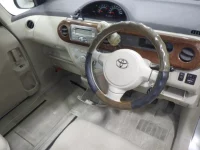 Toyota PORTE лот № 9565 оценка 3.5  с аукциона в Японии 2