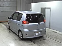 Toyota PORTE лот № 9565 оценка 3.5  с аукциона в Японии 1