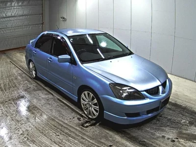 Mitsubishi LANCER  с аукциона в Японии