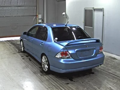 Mitsubishi LANCER  с аукциона в Японии