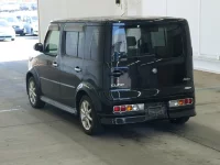 Nissan CUBE лот № 7006 оценка RA  с аукциона в Японии 1