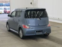 Toyota BB лот № 7052 оценка 3.5  с аукциона в Японии 1