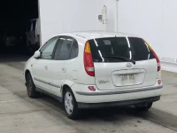 Nissan TINO лот № 3073 оценка 3  с аукциона в Японии 1