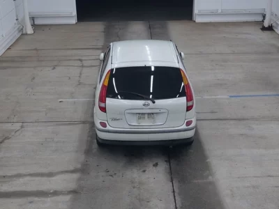 Nissan TINO  с аукциона в Японии