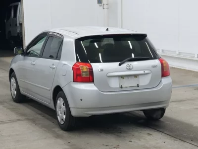 Toyota COROLLA RUNX  с аукциона в Японии