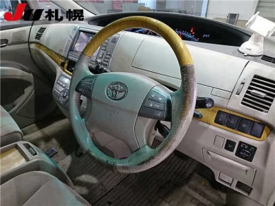Toyota ESTIMA  с аукциона в Японии