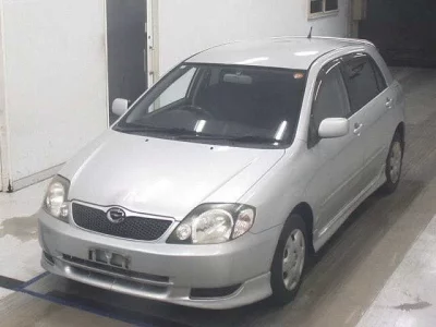 Toyota COROLLA RUNX  с аукциона в Японии