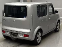Nissan CUBE лот № 4113 оценка RA  с аукциона в Японии 1