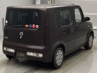 Nissan CUBE лот № 18090 оценка 3.5  с аукциона в Японии 1