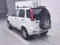 Toyota CAMI лот № 70510 оценка 3.5  с аукциона в Японии 1