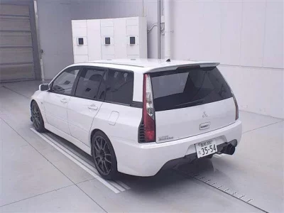Mitsubishi LANCER  с аукциона в Японии